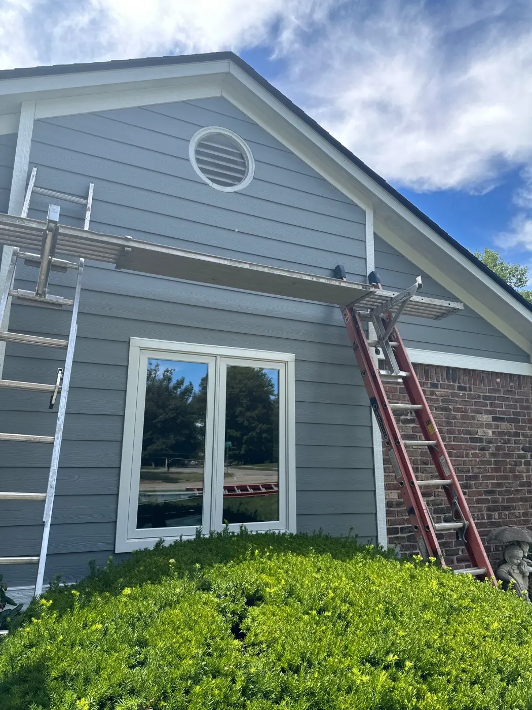 Siding installation documented in Stones Crossing